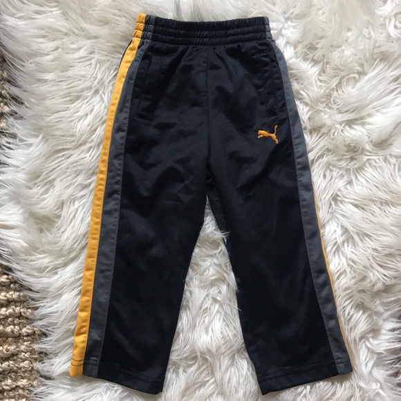 puma track shorts yellow